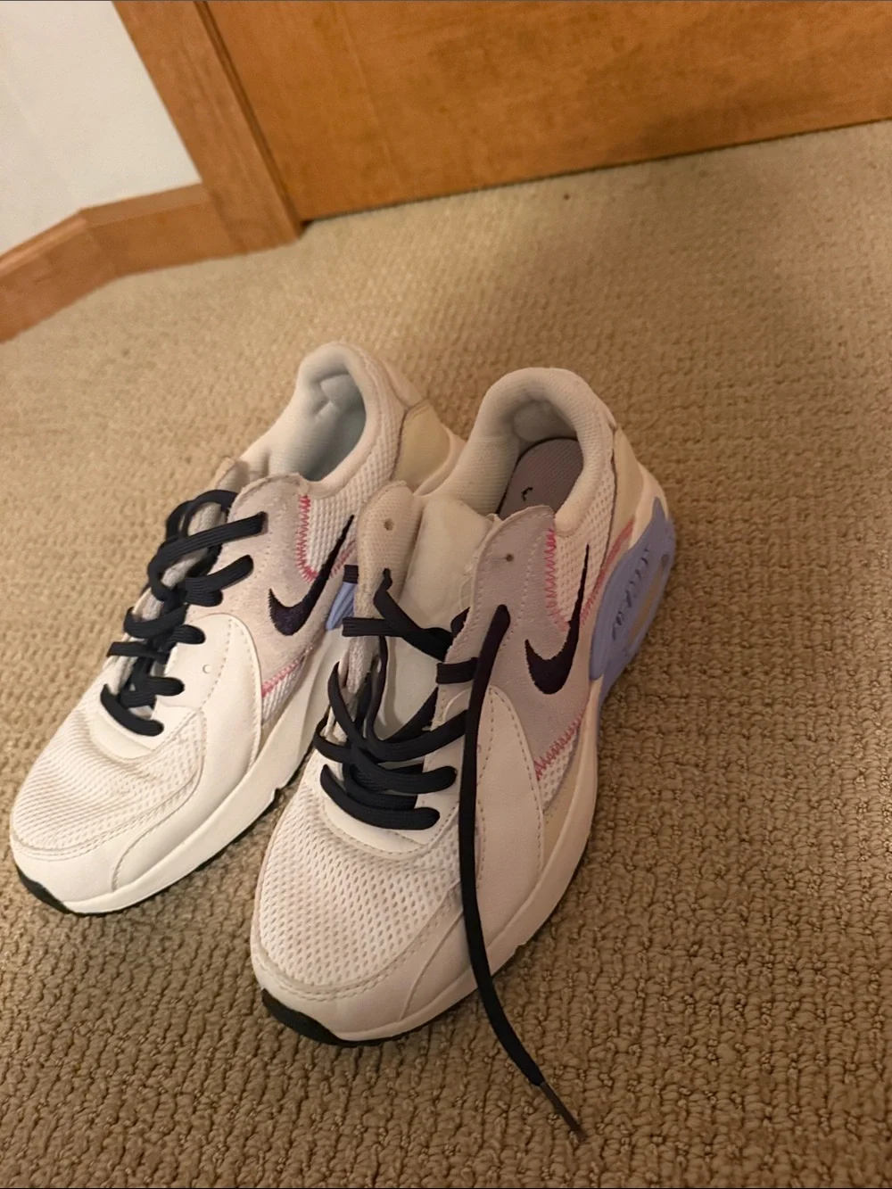 Nike Women's White Sneakers with Black Laces and Pastel Accents